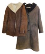 Two sheepskin coats, both single breated with front patch pockets, approx. 36 - 40