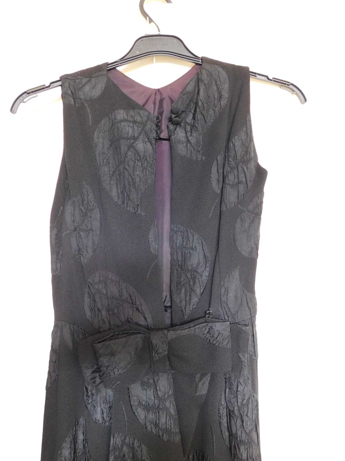 A c.1960's black shift evening dress, with crepe leaf design all over, open back with button - Image 5 of 5