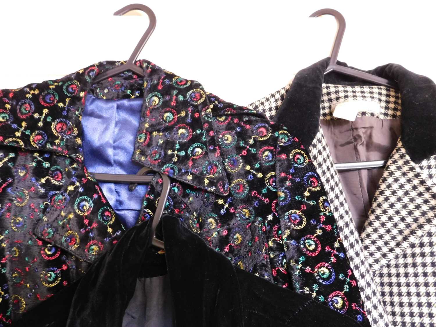 Five lady's jackets: to include a black and white houndstooth jacket with velvet collar by