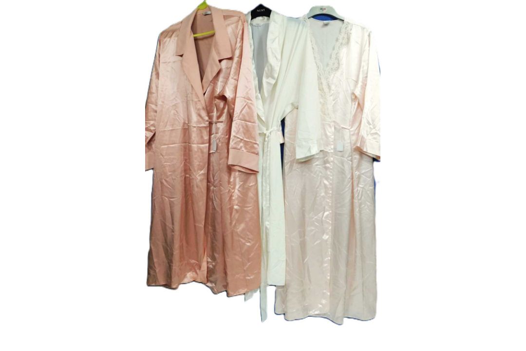 Three modern satin ladies dressing gowns, (3) puckers and loose threads throughoutonly the cream