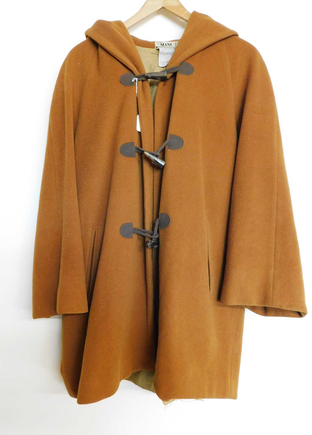 A mid 20th century Italian wool hooded swing coat by Mani, single breasted with faux horn duffle