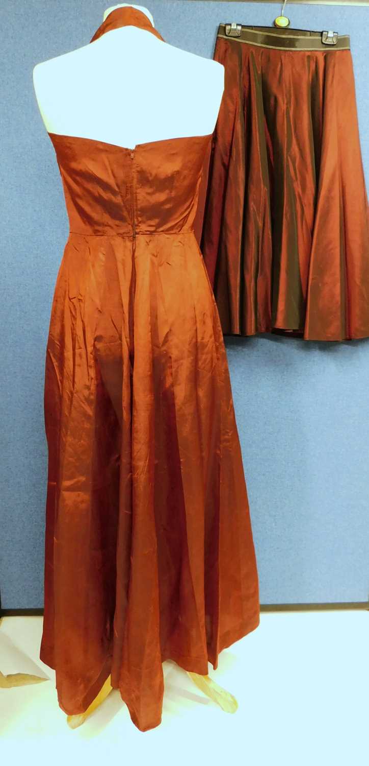 A ladies burgundy halter neck evening gown with fitted ruched bust, zip back together with - Image 3 of 4