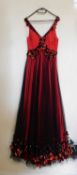A red and black gown, the red silk with black net overlay, sleeveless with ruched bust and sequinned
