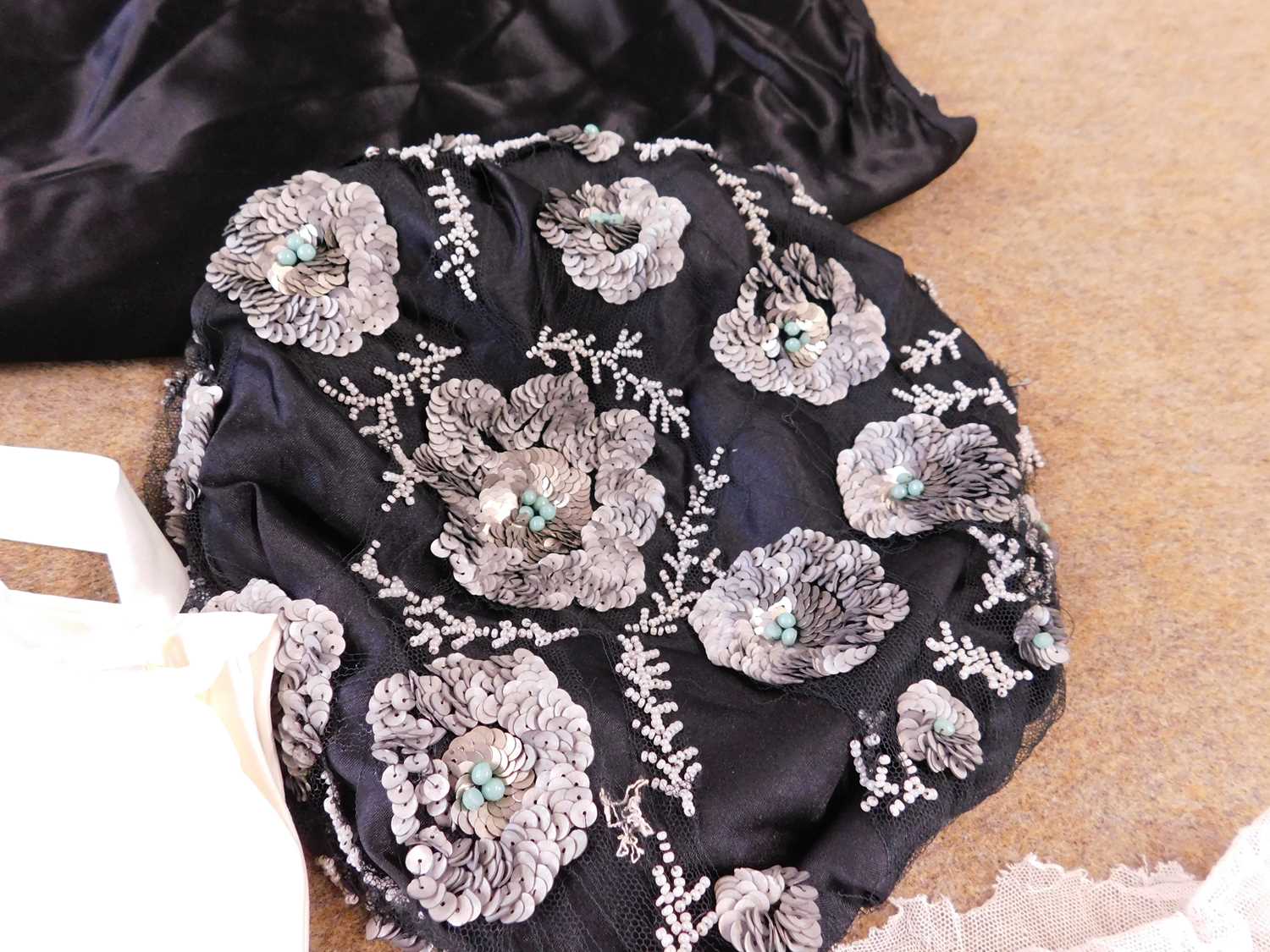 An adapted Victorian black satin skirt, a quantity of machine made lace, a pair of gloves and a - Image 4 of 5