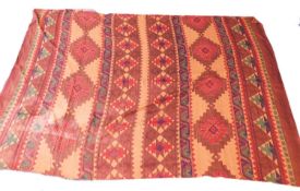 Two Middle Eastern / North African throws and an embroidered wall hanging, to include a printed