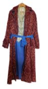 A gentleman's dressing gown, in burgundy and orange damask style material with blue trim and tie