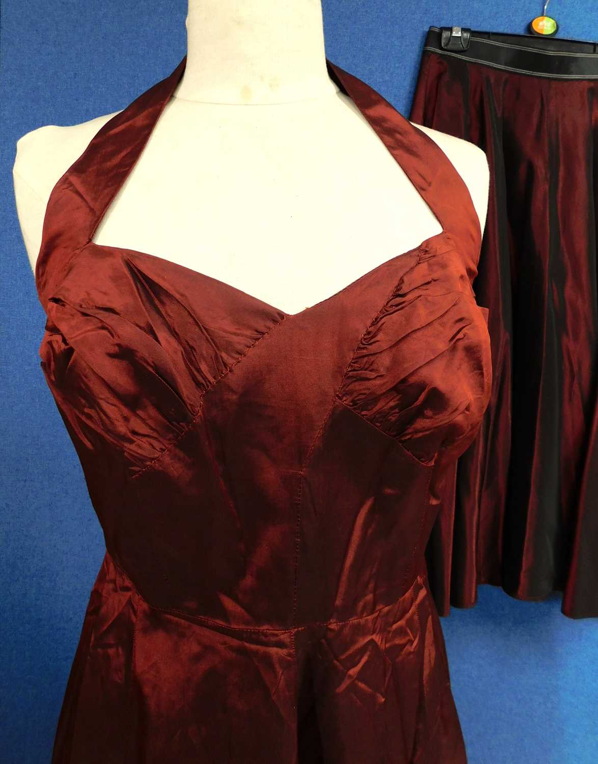 A ladies burgundy halter neck evening gown with fitted ruched bust, zip back together with - Image 2 of 4