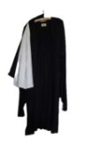 An academic gown, the open fronted black robe with black and cream hood