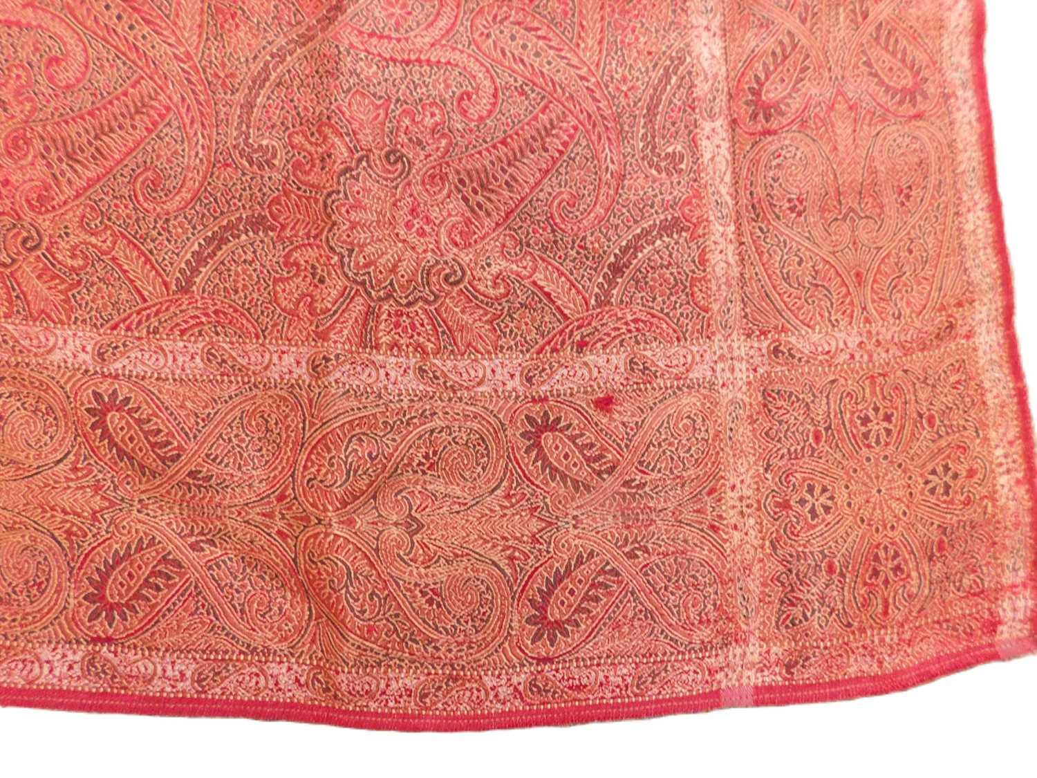 A Norwich silk shawl, in red paisley pattern, approx. 87 x 89cm edges slightly frayed but overall - Image 2 of 3