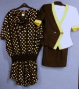 Two 1980's lady's suits, to include a black, white and yellow short sleeved skirt suit by Kasper