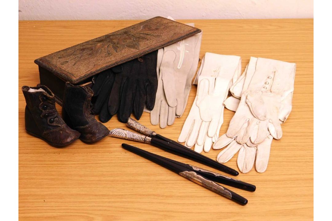 A crewel work glove box and a quantity of gloves and two pairs of silver topped glove stretchers, - Image 1 of 3