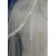 A circa 1960's/70's wedding dress with lace detail to front, frilled cuffs and hem with train - Image 6 of 7