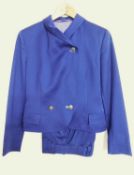 A lady's Versace 'Versus'two piece suit, the crossover button front cropped jacket, withfront flap