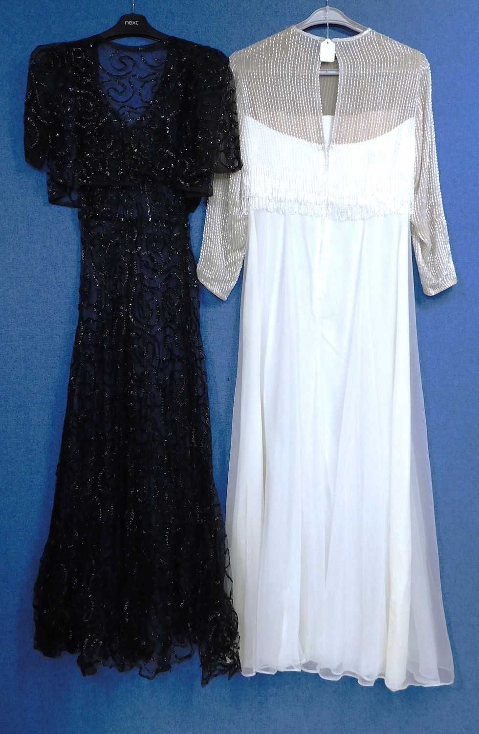 A lady's black net and sequin ribbon V neck dress with matching bolero, together with a cream - Image 2 of 5