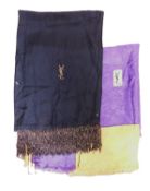 Two Yves Saint Laurent scarves, one in Autumnal satin with fringed edging, approx. 130 x 137cm,