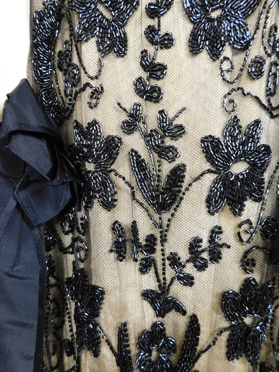 A lady's early 20th Century pale yellow and black jacket and similar skirt, button fronted with - Image 11 of 15
