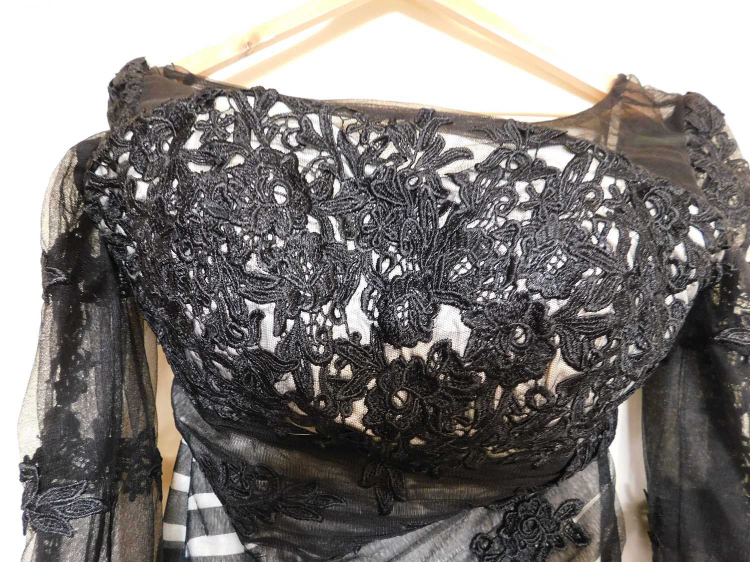 A black and cream gown by Dylan Queen, the cream dress with black net and lace overlay, moulded - Image 5 of 5