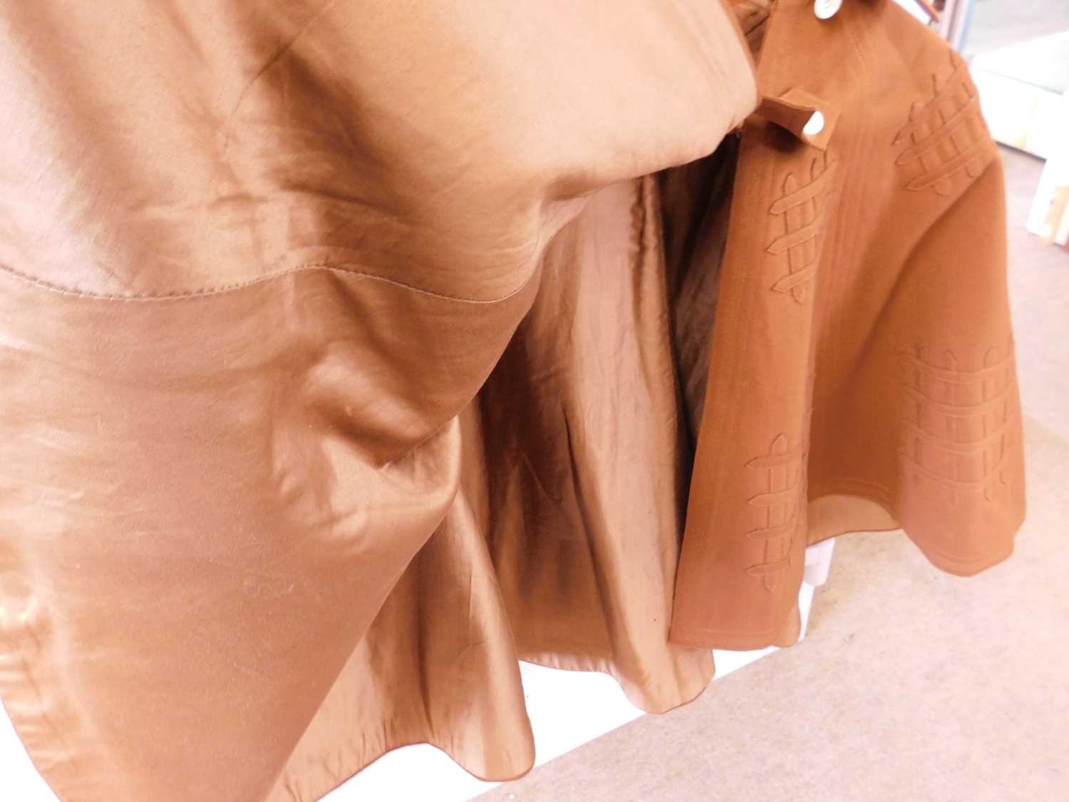 An early 20th century lady's brown felt cape, with double buckle fastening to neck and portcullis - Image 6 of 8