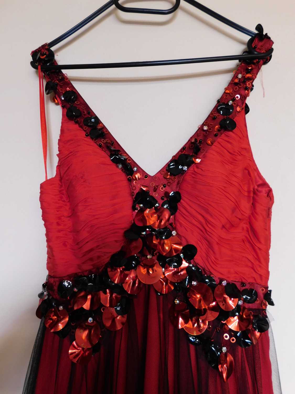 A red and black gown, the red silk with black net overlay, sleeveless with ruched bust and sequinned - Image 3 of 5