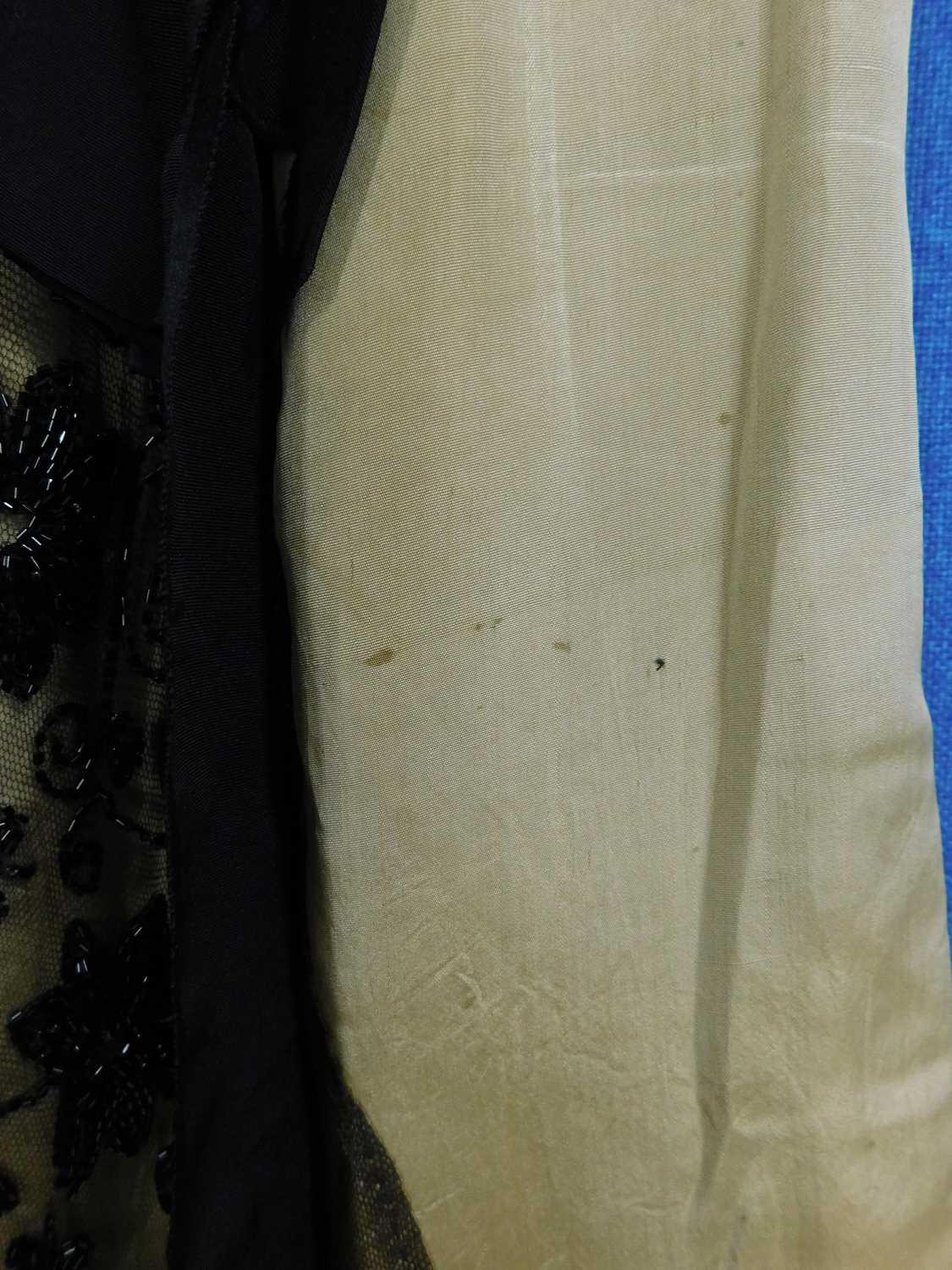 A lady's early 20th Century pale yellow and black jacket and similar skirt, button fronted with - Image 13 of 15