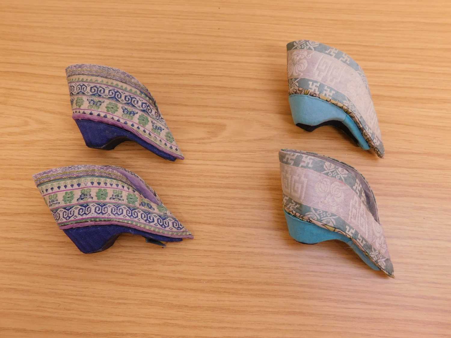 Two pairs of Chinese lotus shoes, the fabric shoes with fabric covered block heels, each approx. 9cm - Image 2 of 3