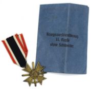 Second World War Third Reich 2nd class War Merit Cross with swords together with original paper