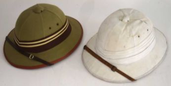 Two 20th Century Pith Helmets