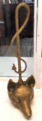 Brass door stop modelled as a fox head and riding crop