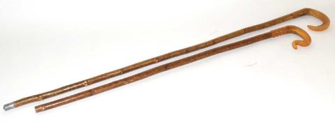 Two shepherds crooks / walking sticks / stalking sticks with horn handles and varnished wooden