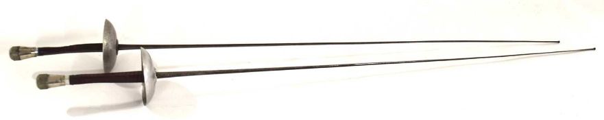 Fencing interest: Two 20th century Leon Paul No.5 french grip fencing foils with leather grip