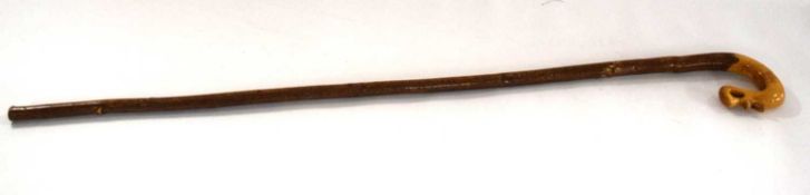 Carved varnished wooden walking / stalking stick with thistle motif to handle. length approx.