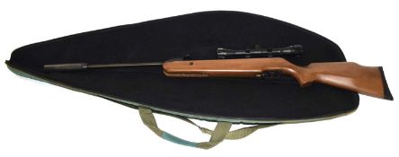 .22 cal SMK 19 break barrel Air rifle with wooden stock and NikkoSterling 4x32 mountmaster scope