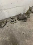 Four small composite garden statues, cat, hedgehog etc