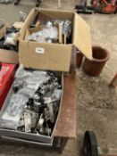 Three boxes of mixed items to include plugs, door handles, brackets etc