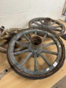 Three wooden and iron cartwheels