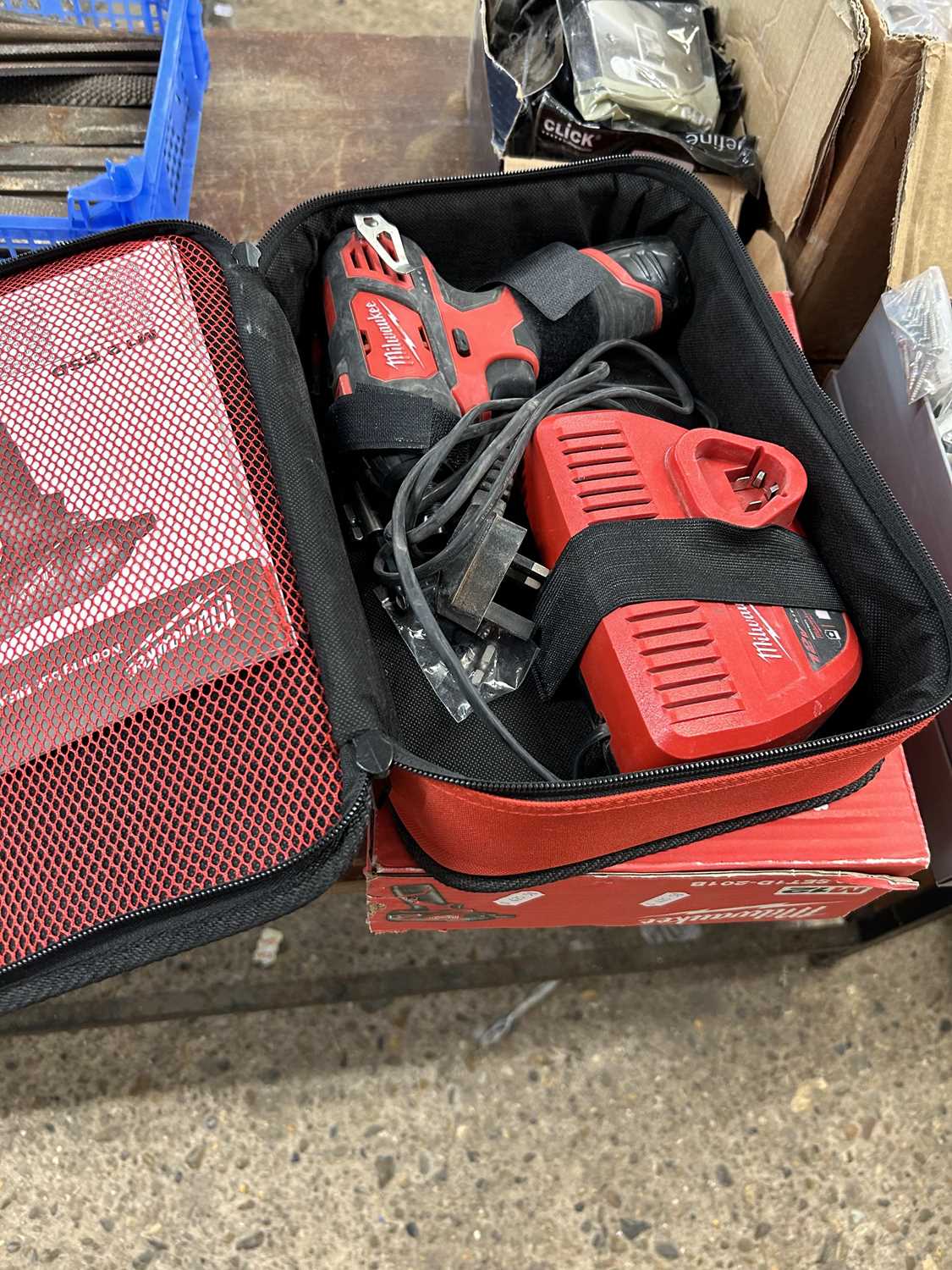 A Milwaukee M12 battery powered driver