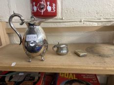 white metal coffee pot together with a mustard pot and vesta
