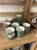 A quantity of Minton Brocade coffee cups and saucers