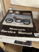 Quantity of Kawasaki manuals and another