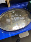 A white metal oval tray