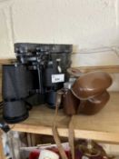 A pair of Prinz 10x50 binoculars, cased and a vintage German camera, cased (2)