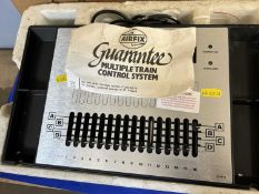 An Airfix multiple train control system