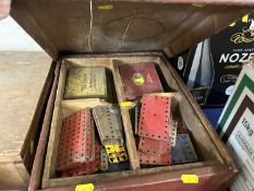 Wooden box containing quantity of early Meccano