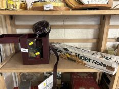 A carriage clock case together with a vintage mantel clock and a Guider Rider Rollers for moving