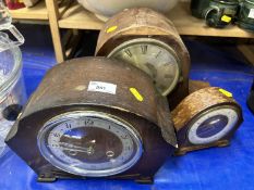 Three dome topped mantel clocks
