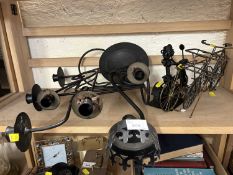 Two metal models of bicycles together with a metal candelabra