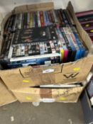 Two boxes containing a large quantity of various DVD's