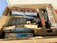 An Airfix multiple train control system together with a box with various train accessories,