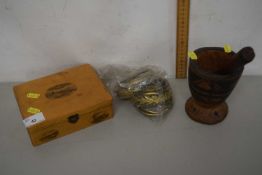 A Mauchline ware box decorated with scenes of Cromer together with a further wooden pestle and