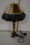 Modern table lamp with feather rim shade